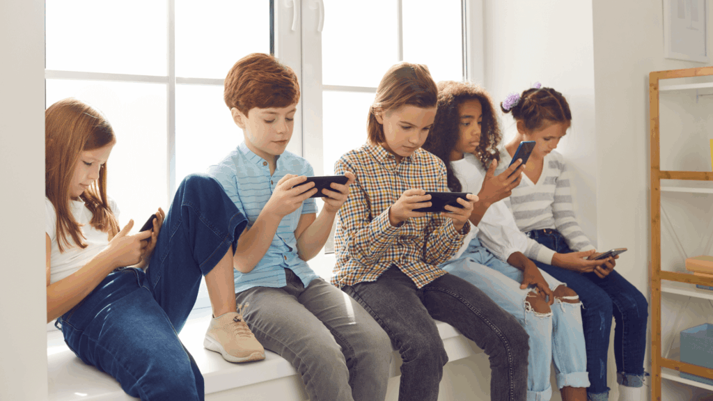 5 Ways To Help Your Kid Feel Motivated To Stay Off Their Devices During Summer Break