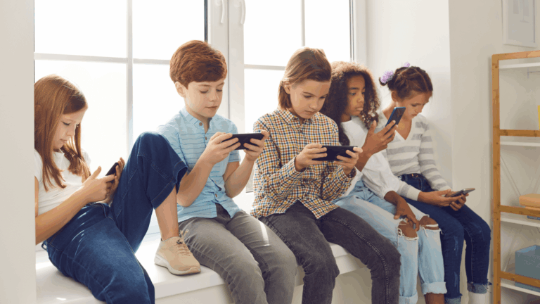 5 Ways To Help Your Kid Feel Motivated To Stay Off Their Devices During Summer Break